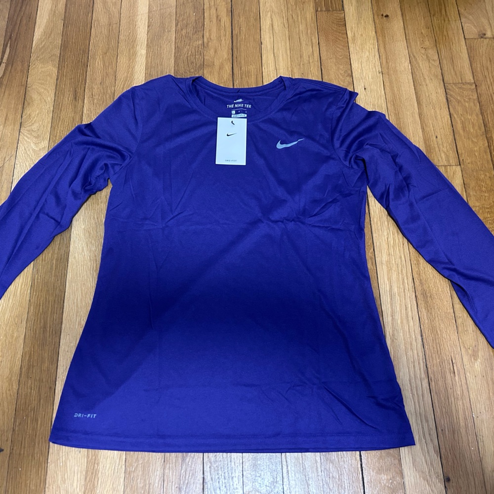 NWT Nike Women’s Dri-FIT Tee in Vibrant Purple with Light Blue Swoosh